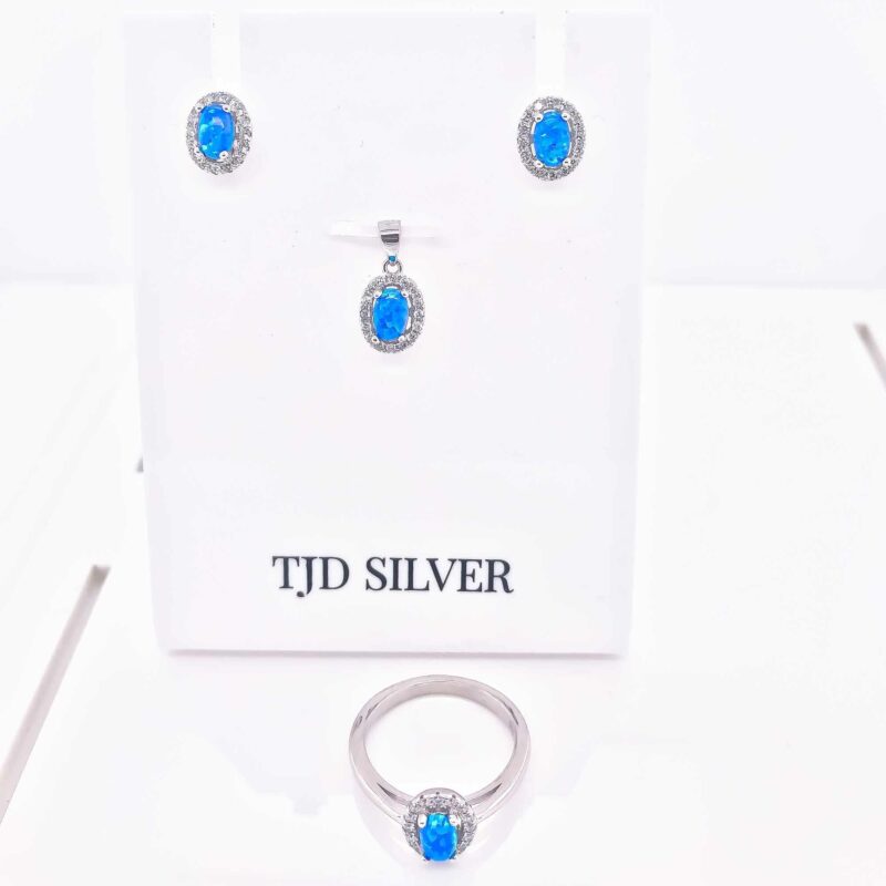 (SET100B) Rhodium Plated Sterling Silver Matching Set Of Oval Created Blue Opal With CZ
